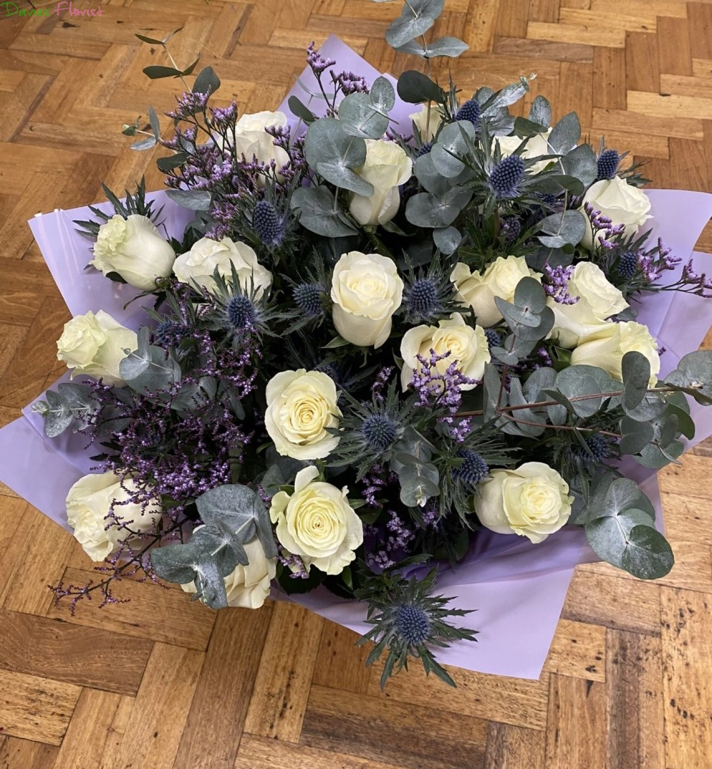 White Rose Handtied with lilac and blue fillers